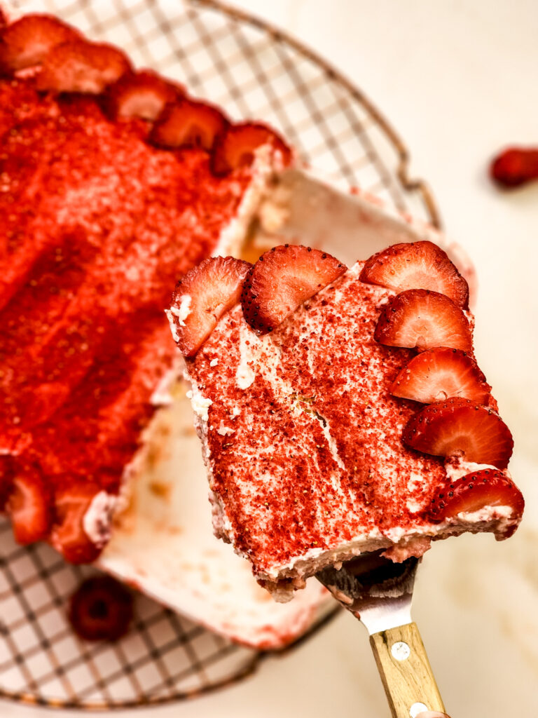 Strawberry Tiramisu - Imagine layers of juicy strawberries simmered with lemon, delicate ladyfingers dipped in strawberry milk, and clouds of mascarpone cream, all crowned with a dusting of vibrant freeze-dried berries. It’s a playful, sun-kissed twist on the classic Italian dessert, and every bite tastes like the start of summer.