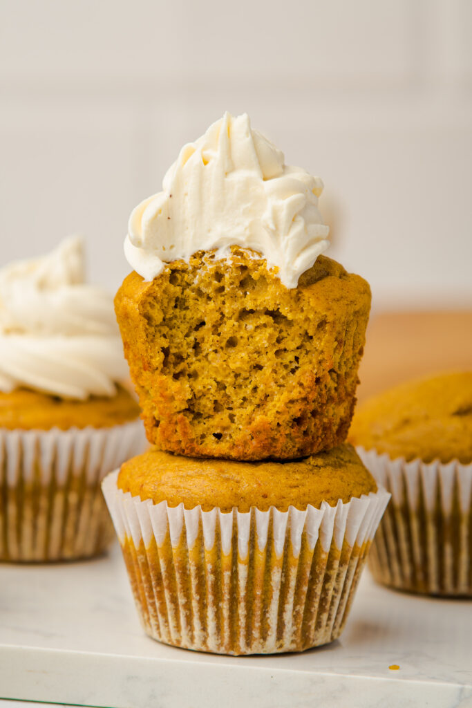 Pumpkin Recipes | Pumpkin Desserts | Pumpkin Muffins | If you’re searching for a cozy, wholesome treat to celebrate pumpkin season, these Flourless Pumpkin Muffins are just the ticket! Made with almond flour and naturally sweetened with honey, they’re perfectly moist, warmly spiced, and entirely gluten-free—so everyone at your table can enjoy a bite. With a dollop of tangy cream cheese frosting on top (totally optional, but highly recommended!), these muffins are the ultimate fall comfort food.