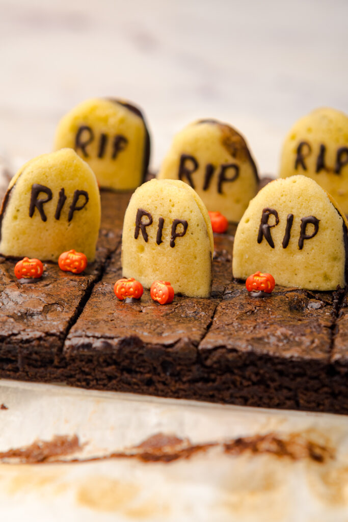 Looking for cute Halloween dessert ideas? Halloween is hands down my favorite excuse to get a little ghoulish in the kitchen, and these Graveyard Brownies are my go to for a treat that’s as fun to make as it is to eat! If you’re hosting a haunted bash or just want to surprise your family with something sweet and spooky, this recipe is a total crowd pleaser and it all starts with a humble box of brownie mix.