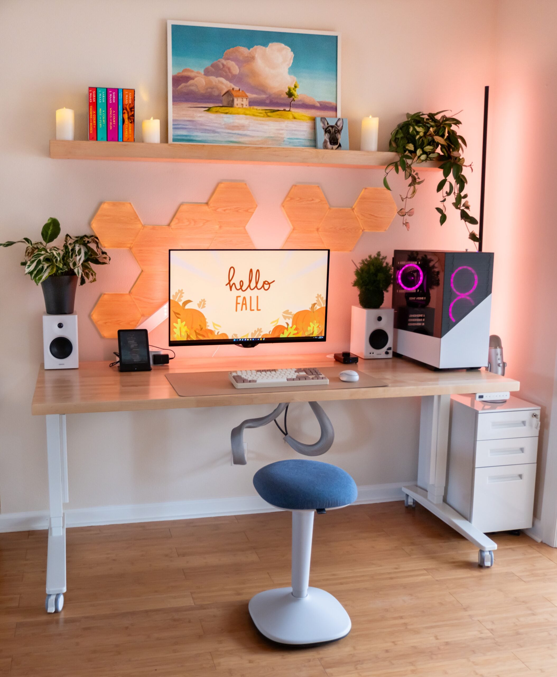 Gift Guide for People Who Practically Live at Their Desk: UPLIFT Accessories Review, featuring Engage Stool, Pop-up Power Grommet, Hook and Loop Wire Wraps, and the 3-Drawer Narrow Square File Cabinet.