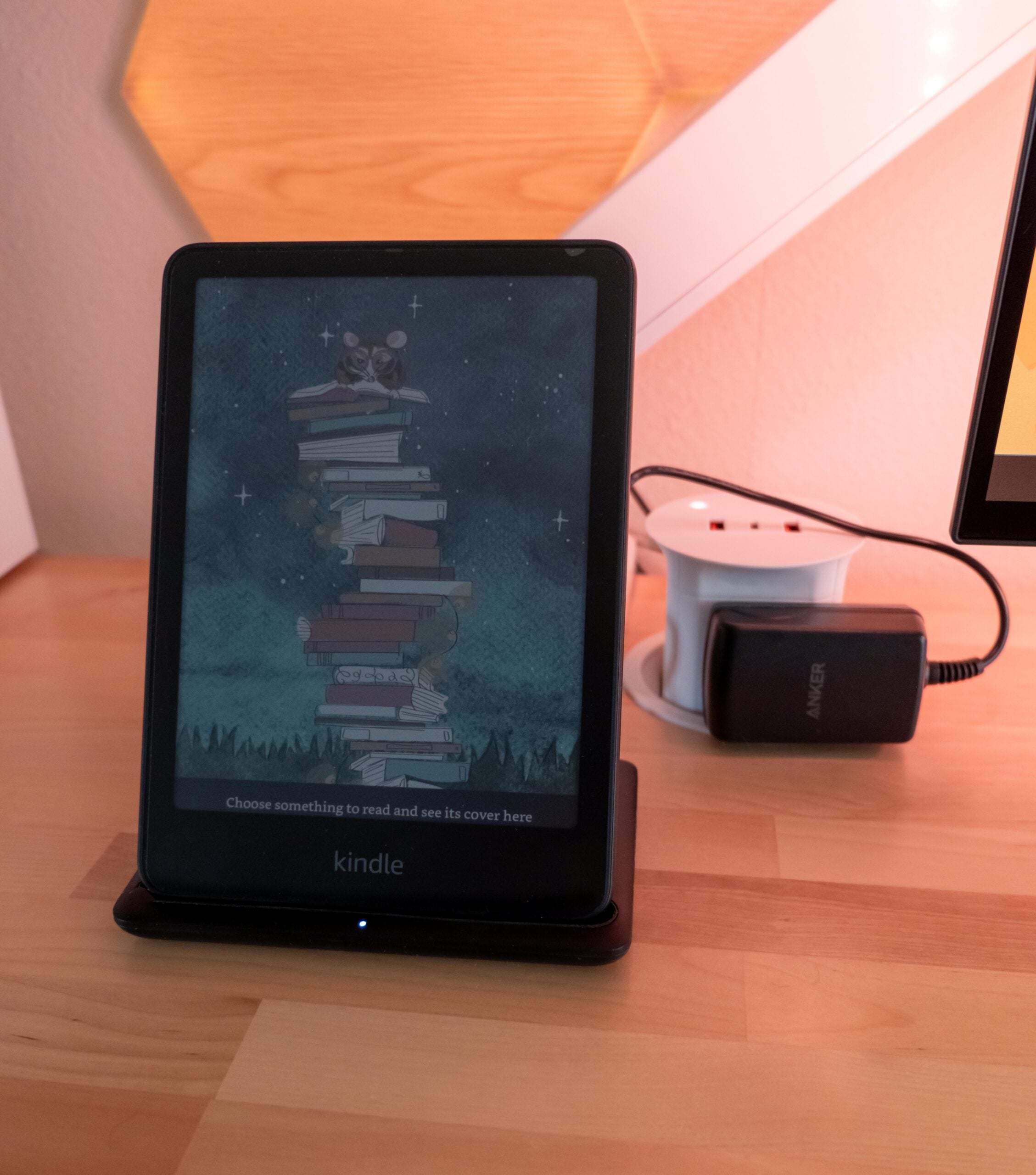 Gift Guide for People Who Practically Live at Their Desk: UPLIFT Accessories Review, featuring Engage Stool, Pop-up Power Grommet, Hook and Loop Wire Wraps, and the 3-Drawer Narrow Square File Cabinet.