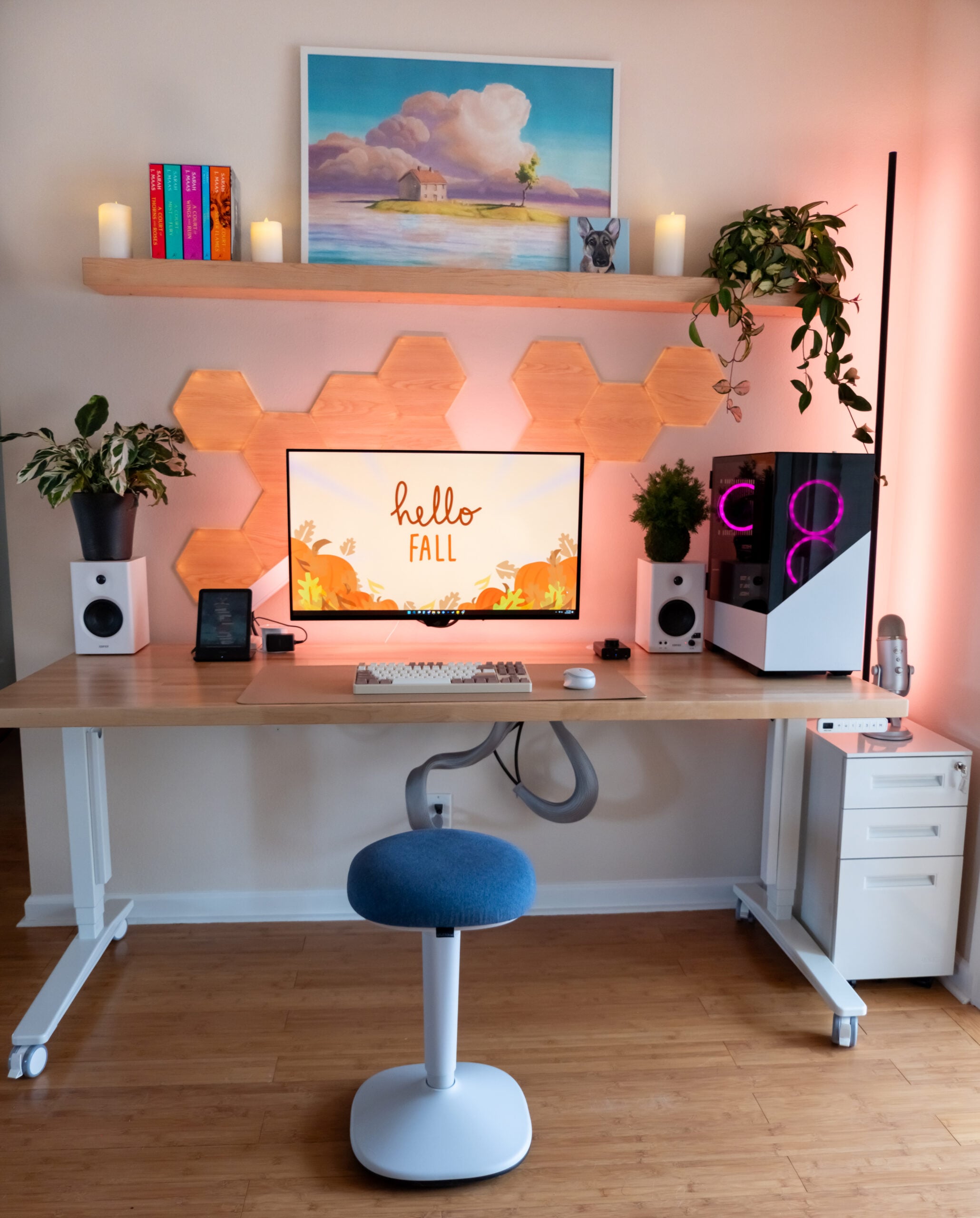 Gift Guide for People Who Practically Live at Their Desk: UPLIFT Accessories Review, featuring Engage Stool, Pop-up Power Grommet, Hook and Loop Wire Wraps, and the 3-Drawer Narrow Square File Cabinet.